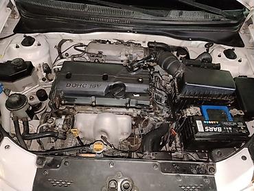 Kia: Kia Rio: 1.4 l | 2010 il Sedan — 16