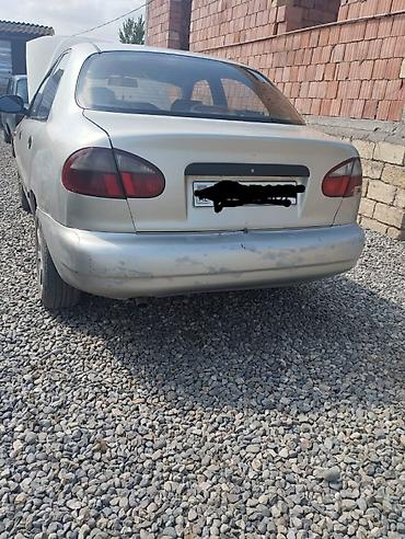 30 kuza: Daewoo Lanos: 1.3 l | 2010 il Sedan — 2