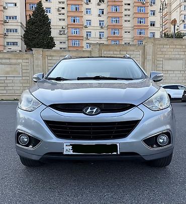 e60 guzgu: Hyundai ix35 Limited 4WD – gümüş rəngli şəhər/krosover. Texniki və — 2