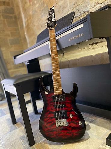 Gitaralar: İbanez GRX 70 QA TBR Çatdırılma xidmətimiz mövcuddur. Həftənin 7 — 1