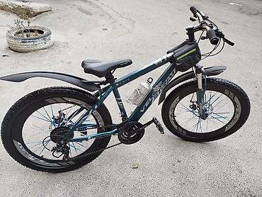 İdman velosipedləri: Dağ velosipedi – 24” təkərlər, enli protektorlu şinlər. Rəng: tünd — 9