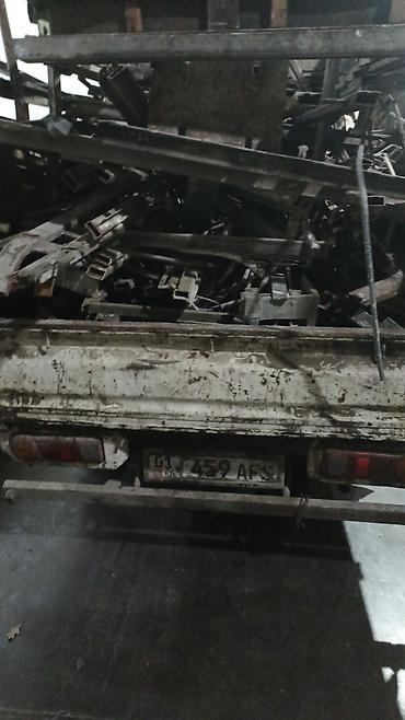 Приём и вывоз металлолома. - Грузовой автомобиль с открытым кузовом