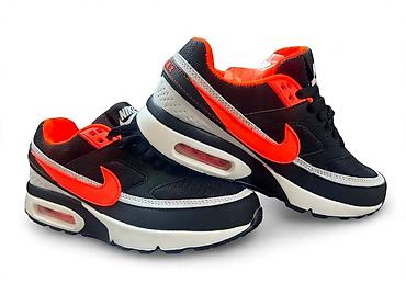 air max evo: Nike Air Max tenisice – crno/sivo-belo sa jarko narandžastim detaljima — 1