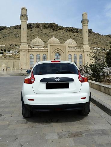 led duman isiqlari: Nissan Juke – kompakt krossover, ağ rəng. Şəhər üçün çevik ölçü və — 2