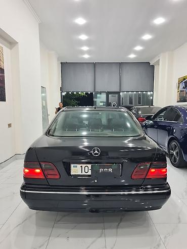 audi 6: Mercedes-Benz E-Class: 2.6 l | 2001 il Sedan — 7