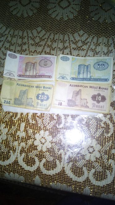 2 dollar nece manatdir: Antikvar pullar millidir Yaxwi vaziyattadir.Harasindan bir neca