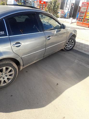 опель зафира а: Volkswagen Passat: 1.8 л | 2004 г. Седан — 5