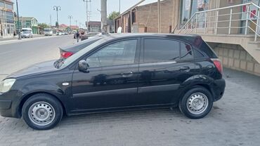 masin kia: Kia Rio: 1.4 l | 2009 il Hetçbek