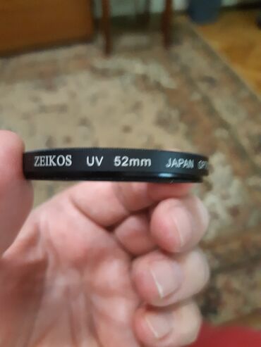 фото на стекле: Набор фотоаксессуаров и фильтров - УФ‑фильтр ZEIKOS 52 mm (Japan)