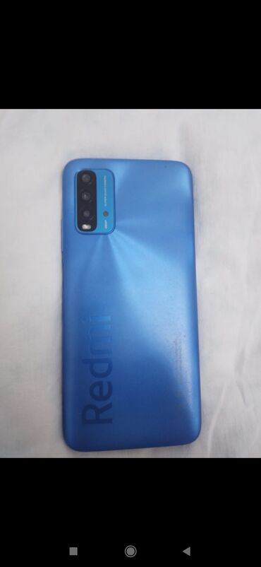 телефон флай фс 454 нимбус 8: Xiaomi Redmi 9T, 128 ГБ, цвет - Синий, 
 Отпечаток пальца, Face ID