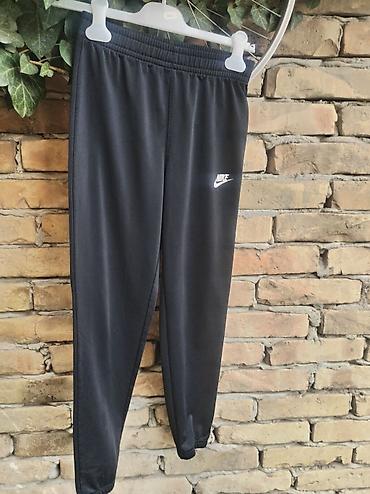 energetics patike: Nike dečije trenerke – Dri‑FIT donji deo - Model: Nike Dri‑FIT, crne — 1