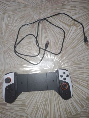 телефон fly с телевизором: Mobil oyunlar üçün teleskopik gamepad - Smartfon üçün yanlardan