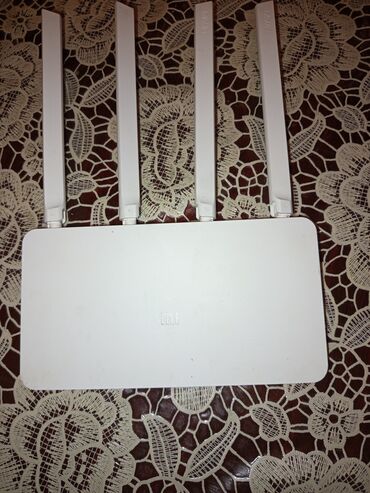 Kompüter və noutbuk aksesuarları: Xiaomi Mi Wi‑Fi Router (4 antennali) - Brend: Xiaomi (Mi loqosu ilə)