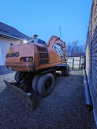 Экскаваторы: Экскаватор, Samsung, 1998 г., Колесный — 9