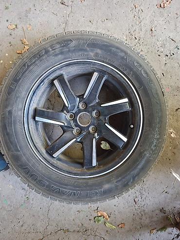 Шины и диски: Комплект зимних колес для кроссоверов/SUV. Состав: - Шины Goodyear — 2