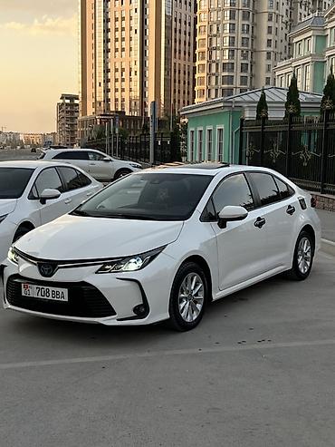 byd e2: Toyota Corolla: 2021 г., 1.8 л, Вариатор, Гибрид, Седан — 3