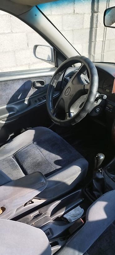 skoda octavia a7: Mazda Capella: 1999 г., 2 л, Механика, Бензин, Универсал — 2
