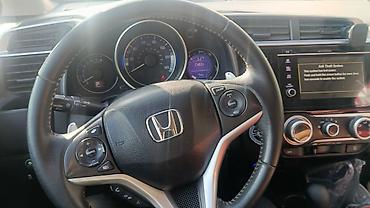вертикальный очки: Honda Fit: 2017 г., Автомат, Бензин, Хэтчбэк — 9