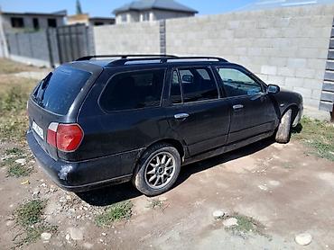 кышкы: Nissan Primera: 2001 г., 1.8 л, Кол менен иштөөчү, Бензин, Универсал — 3
