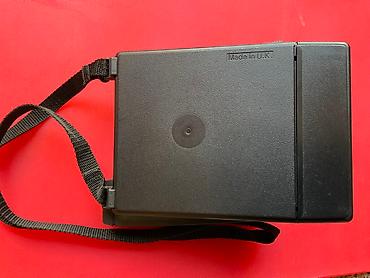 kingdom come: Polaroid 600 İmpulse- fotokamerası. İstehsalçı ölkə: United Kingdom. 1 — 5