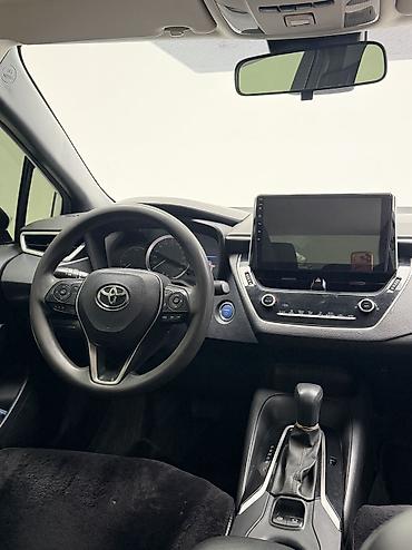 byd e1: Toyota Corolla: 2019 г., 1.8 л, Вариатор, Гибрид, Седан — 6