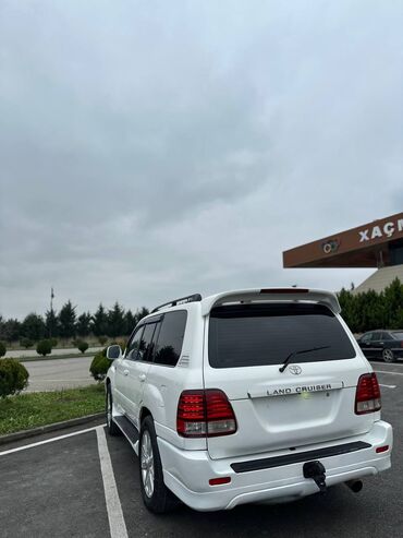Toyota: Toyota Land Cruiser 2002 – baxımlı, əziyyət görməyib. Ağ rəngdədir — 6