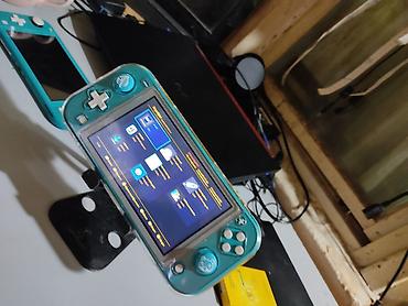 Видеоигры и приставки: Nintendo switch lite чипованный(прошитый) внутренняя память 33гб+64гб — 2