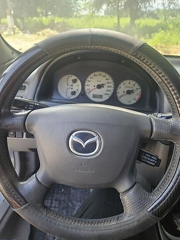 лад крузер: Mazda 626: 2001 г., 2 л, Механика, Бензин, Универсал — 6