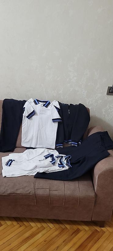 yeni mekteb formalari: Məktəb forması dəsti – oğlanlar üçün Tərkib: - 3 ədəd ağ polo köynək — 3