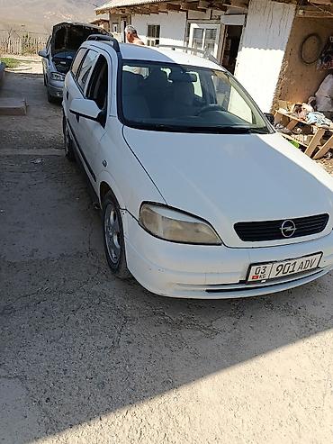 е 303 302: Opel Astra: 1999 г., Механика, Бензин, Универсал — 4