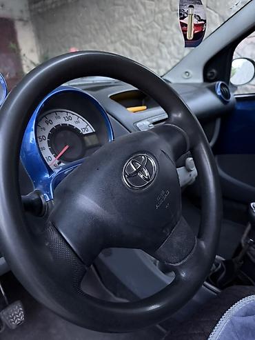 тайота арис: Toyota Aygo: 2009 г., Механика, Бензин, Хэтчбэк — 7