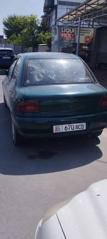 vaz 12: Mazda 121: 1995 г., 1.3 л, Механика, Бензин, Седан