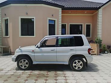 7 nəfərlik avtomobillər: Mitsubishi Pajero: 1.8 l | 1998 il 350000 km Ofrouder/SUV — 2