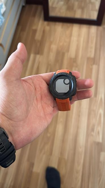 garmin solar: Спортивные часы Garmin (серия Instinct), оранжевый ремешок. Основные — 1