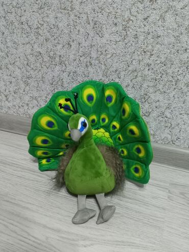 Oyuncaqlar: Dinozavr ~35 sm Ördək ~25 sm Tovuz quşu ~ 20sm Tutuquşu ~ 20 sm — 3