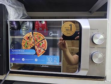 Микроволновая печь Midea XpressWave - Объем: 20 л - Механическое at lalafo.kg Микроволновая печь Midea XpressWave - Объем: 20 л - Механическое