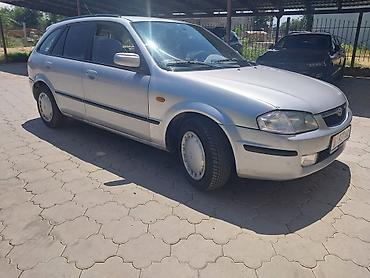 a8 d2: Mazda Familia: 1999 г., 1.6 л, Механика, Бензин, Универсал — 1