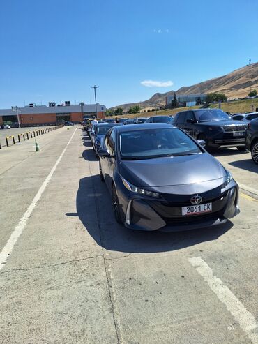 гибрид машина купить: Автомобиль Toyota Prius prime в цвете мокрого асфальта (темно-серый