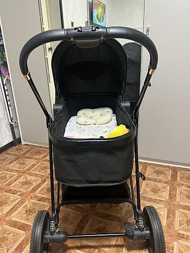 штаны кожаные: Коляска-люлька Innig Baby, цвет черный. Основные особенности: - — 3