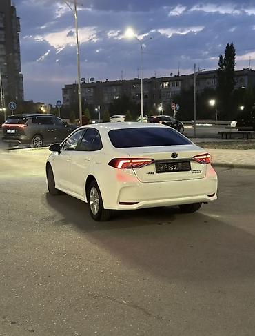voxy noah: Toyota Corolla: 2021 г., 1.8 л, Вариатор, Гибрид, Седан — 5