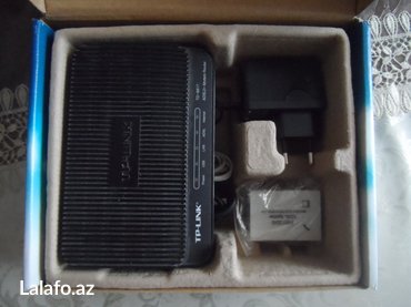 Modemlər və şəbəkə avadanlıqları: Modem ağ- dial up (1 portlu)-5 manato biri qara (tp-lİnk)-1portlu-10 — 3