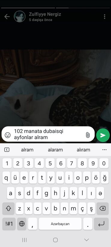 Tikinti və təmir: Xidmət: Dubay istehsalı iPhone-ların alınması Mətn görüntüsündə olan