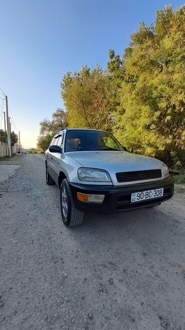 Toyota: Toyota RAV4: 2 l | 1997 il Ofrouder/SUV — 2