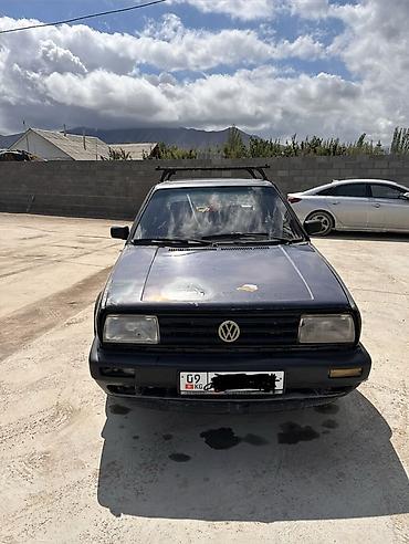 jac 9: Volkswagen Jetta: 1990 г., Седан — 2