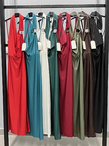 Haljine: 🔥Elegantna duga haljina bez rukava sa halter izrezom
✅2700 din — 16