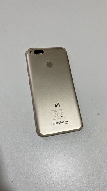 telefon sekilleri: Xiaomi Mi A1, 64 GB, rəng - Boz, 
 Zəmanət, Sensor, Barmaq izi