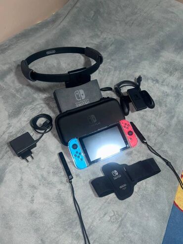 Nintendo 3DS: Nintendo switch v2. 128GB. Ideal veziyyetdedir. Hec bir problemi