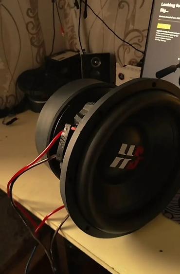 subwoofer satilir: KICX Q412 Subwoofer Subwooferin kicik zele alib ve spider bolgesine — 4