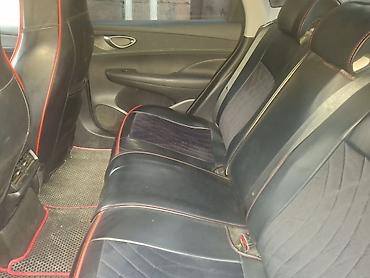 latun satisi: BYD Qin Plus (sedan) – Yango brendli taksi üçün bükülü vinil reklam — 4
