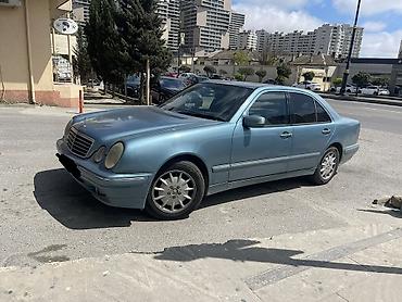 w210 panel: Mercedes-Benz E-Class (W210) sedan - Gövdə: 4 qapılı sedan, açıq mavi — 1